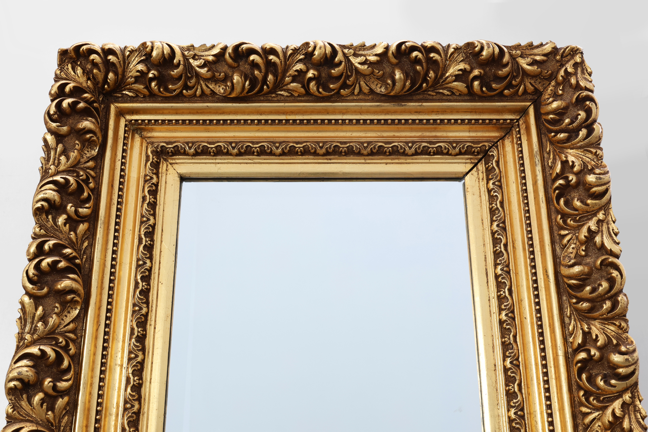 Baroque style giltwood mirror with acanthus carvings, France ca. 1880thumbnail